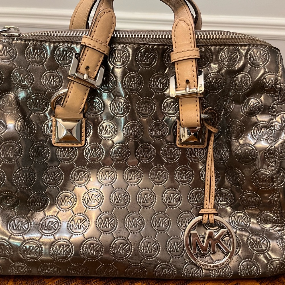 Michael Kors silver and tan purse.